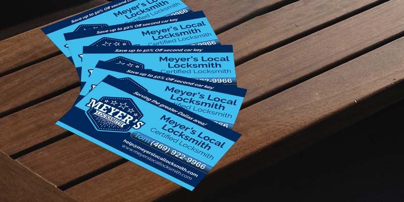 A group of blue and white locksmith business cards Description automatically generated with medium confidence